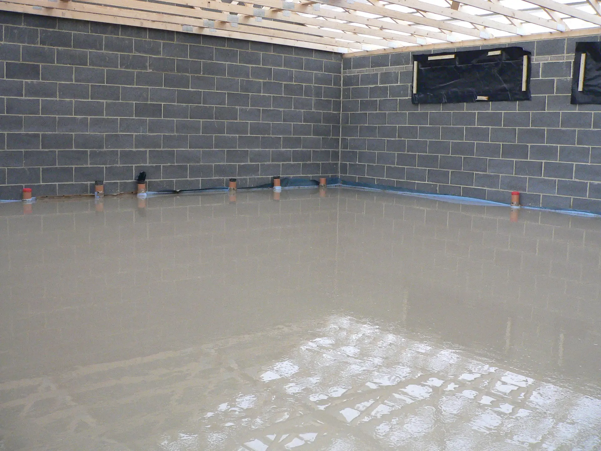 Freshly laid flowing screed in the new extension at Keyworth Rugby Club