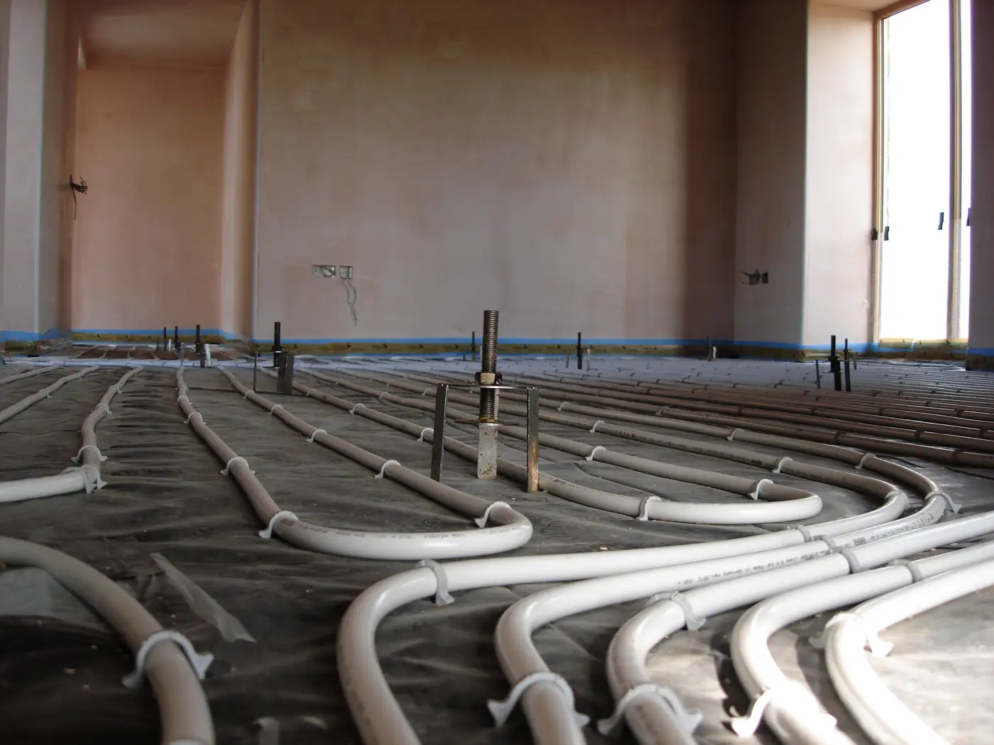 Underfloor heating pipe laid before the screed