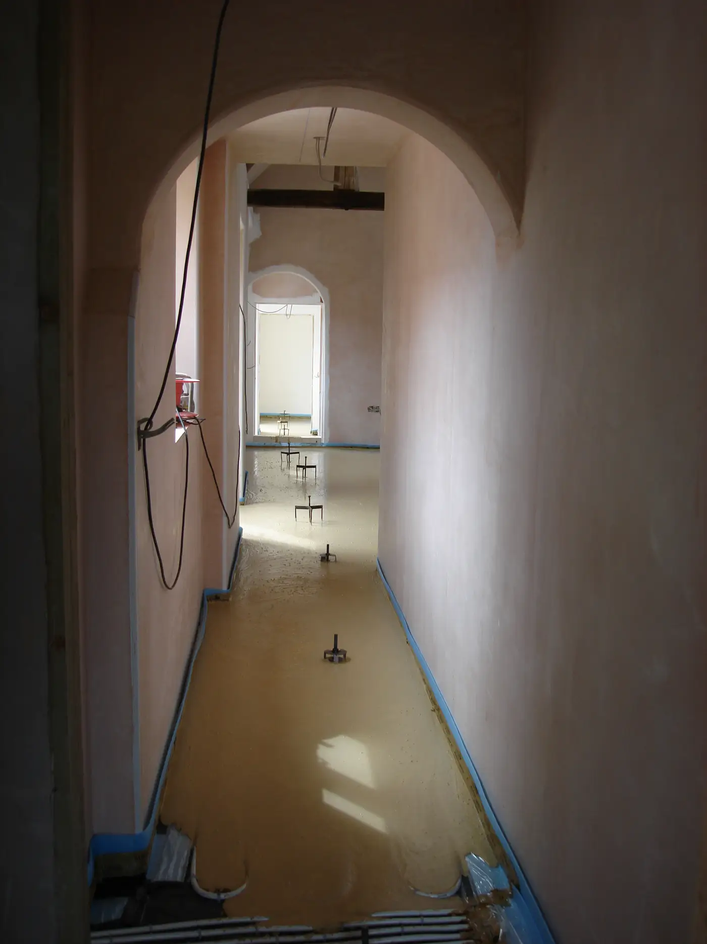 Screed through the arched hallway