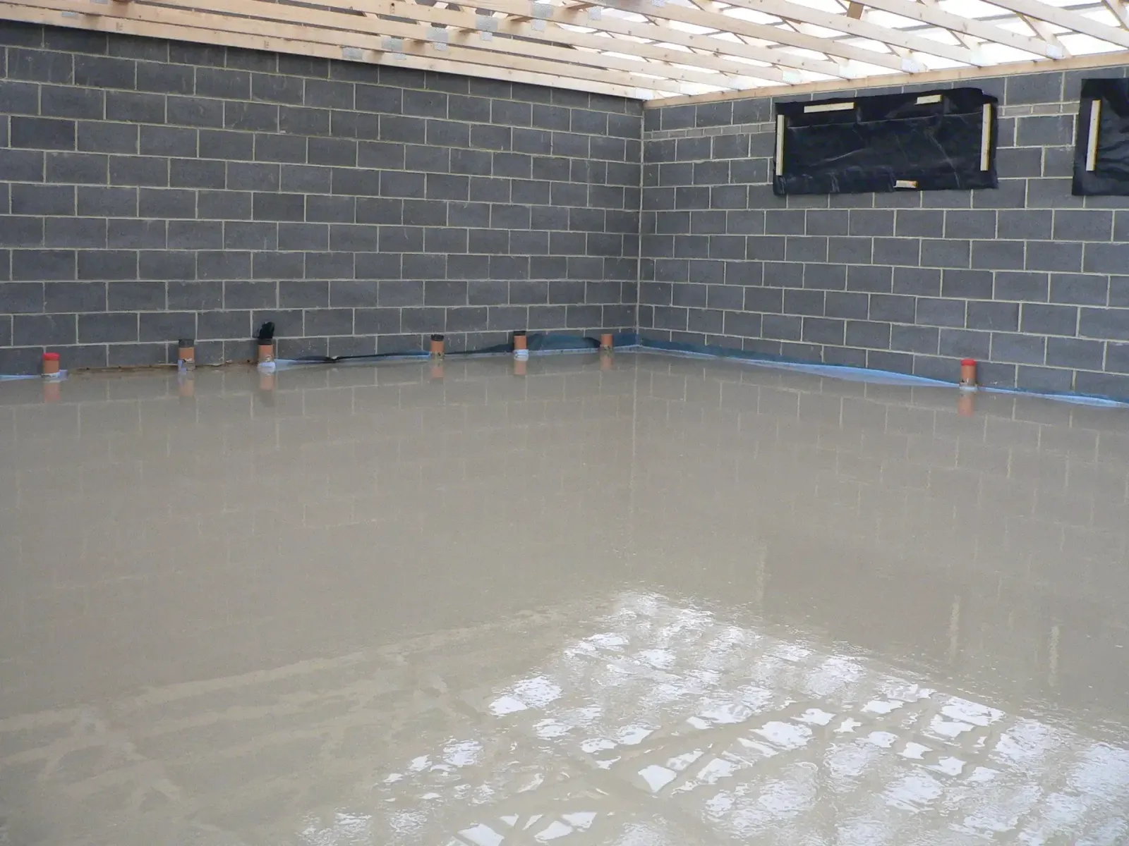 Freshly laid flowing screed in the new extension at Keyworth Rugby Club